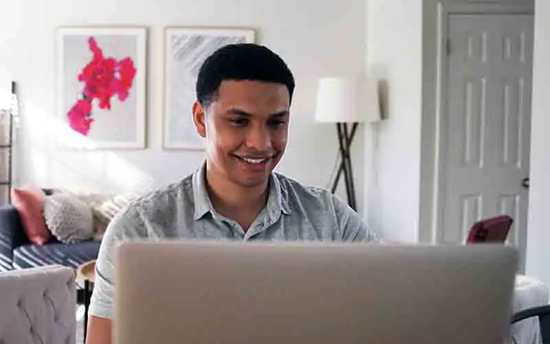 Man Looking at Laptop